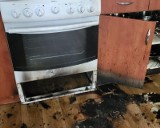 Akcja straży pożarnej w Czempiszu. Paliła się kuchenka gazowa i koc. ZDJĘCIA